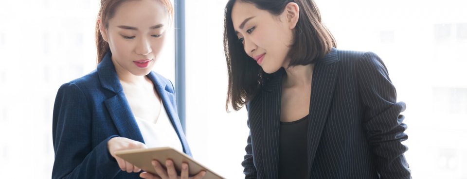 Two business ladies talking