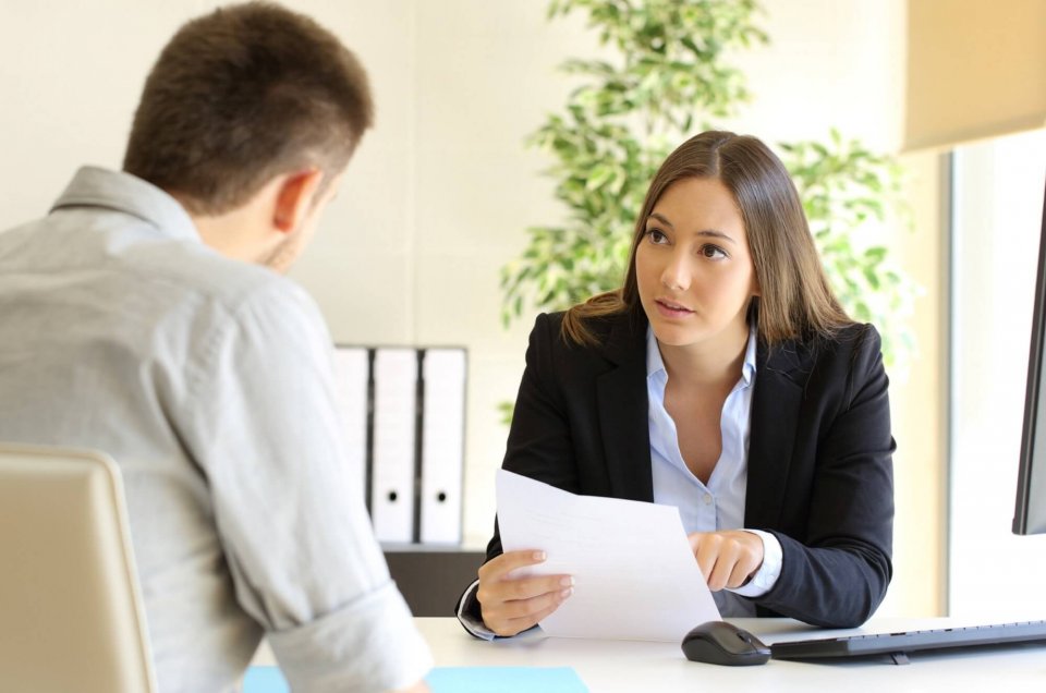 An employer unfairly dismissing an employee at her company.